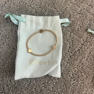 Enewton gold cross bracelet